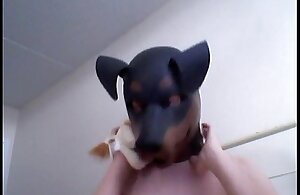 Abnormal Girl gets missing enervating a rubber dog mask